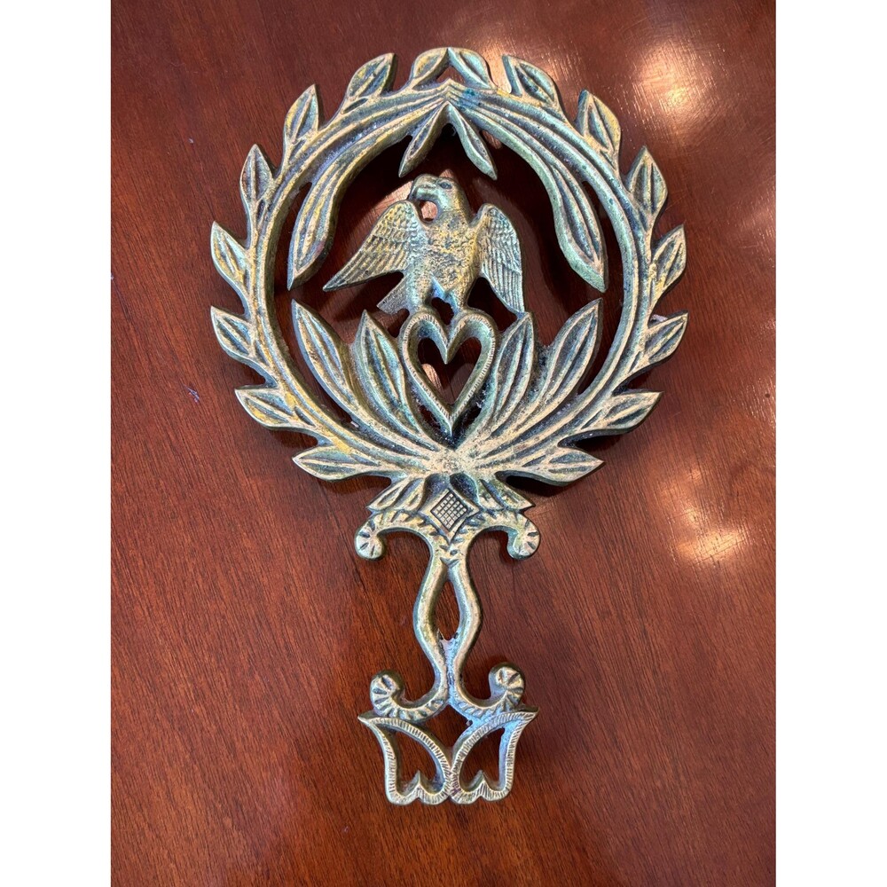 Vintage brass trivet with eagle